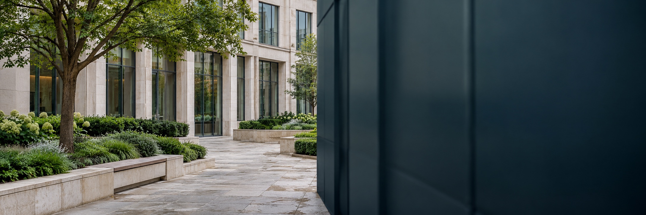 Contemporary building overlooking a landscaped courtyard